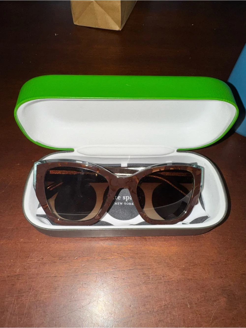 kate spade Yolanda brown tortoiseshell cat-eye sunglasses with green case